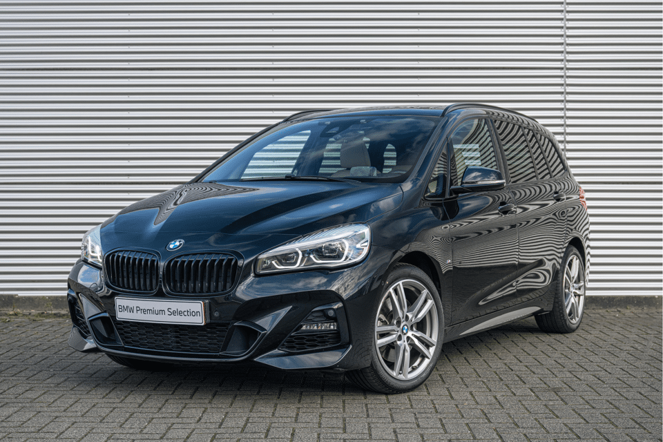 BMW 2 Serie Gran Tourer 220i 7p. High Executive M Sport Automaat - Afbeelding 1