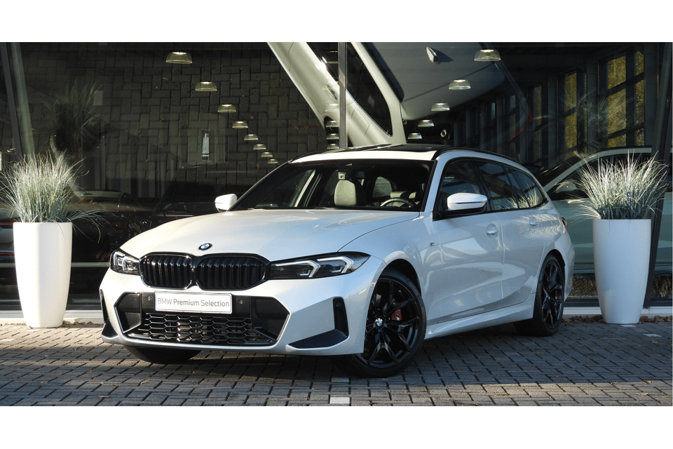 BMW 3 Serie Touring 320i High Executive M Sport Automaat - Afbeelding 1