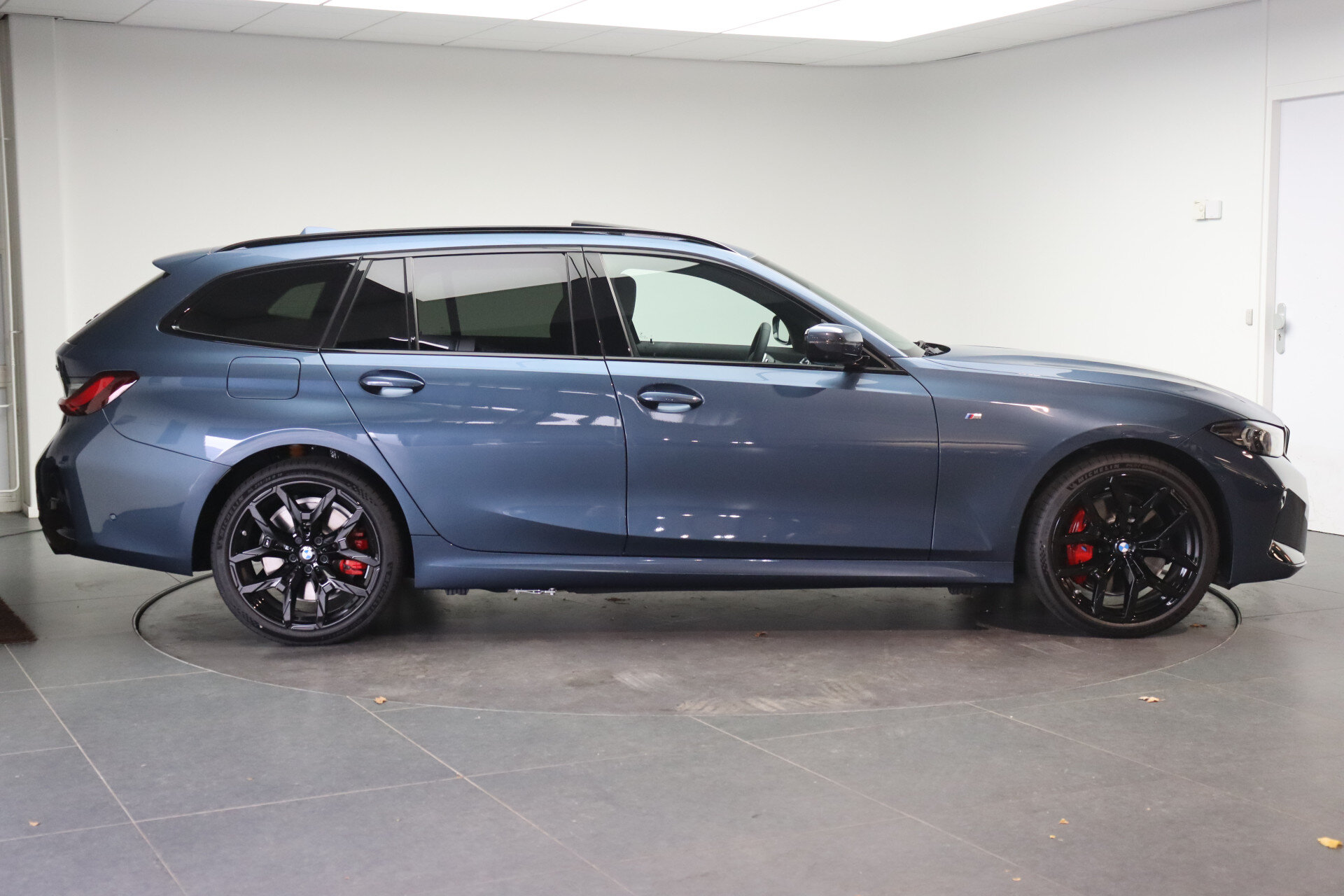 BMW 3 Serie Touring 330e High Executive M Sport Automaat - Afbeelding 4