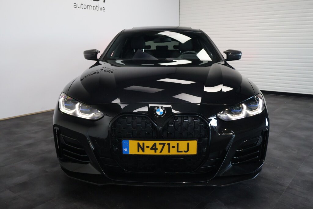 BMW 4 Serie Gran Coupé M440i xDrive 375pk | Carbon | Schuifdak | Leder | H&K - Afbeelding 2