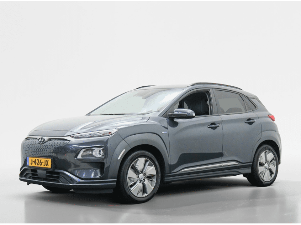 Hyundai KONA EV Premium 64 kWh | SOH 100% | 3-Fase | Warmtepomp | BlueLink - Afbeelding 1