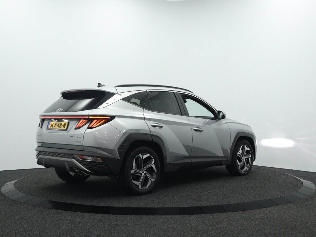 Hyundai Tucson 1.6 T-GDI HEV Comfort Smart | Navigatie | Camera | Stoelverwarmi - Afbeelding 2