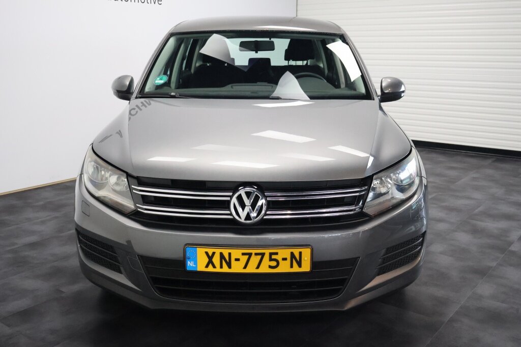 Volkswagen Tiguan 1.4 TSI Sport&Style | Trekhaak | Stoelverwarming | Navigatie - Afbeelding 2