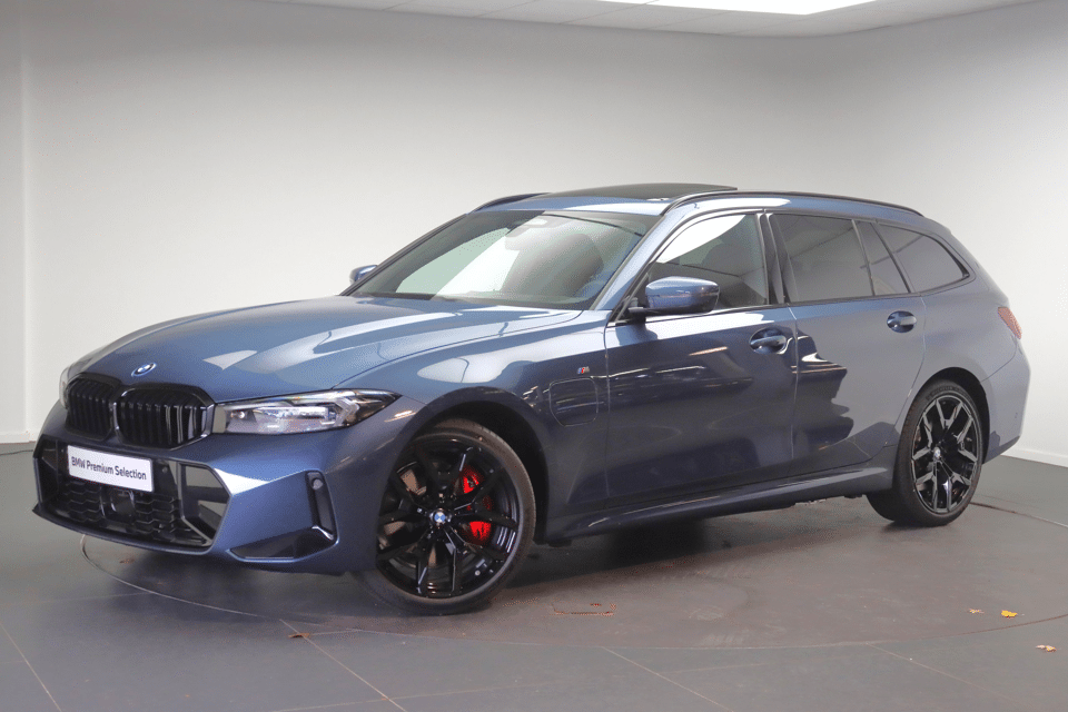 BMW 3 Serie Touring 330e High Executive M Sport Automaat - Afbeelding 1