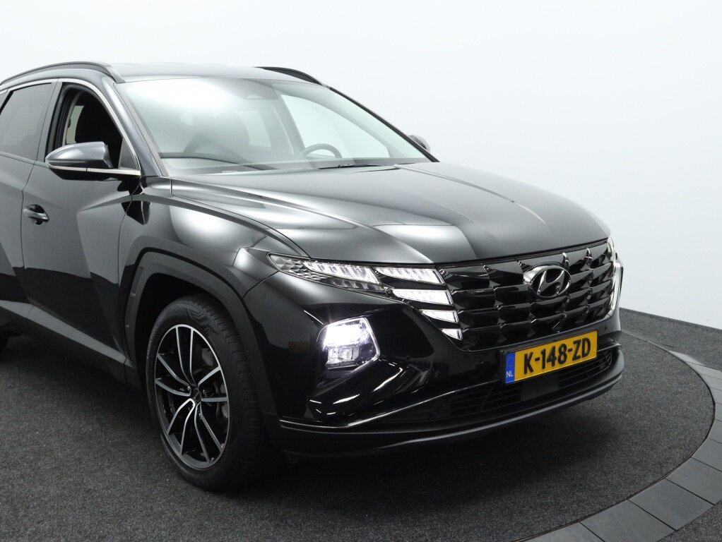 Hyundai Tucson 1.6 T-GDI HEV Comfort Smart | Navigatie | Camera | Stoelverwarmi - Afbeelding 3