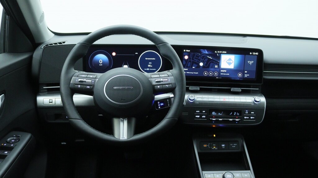 Hyundai Kona Electric Pure Edition 64,8kWh | Stoelverwarming | Navigatie | - Afbeelding 3