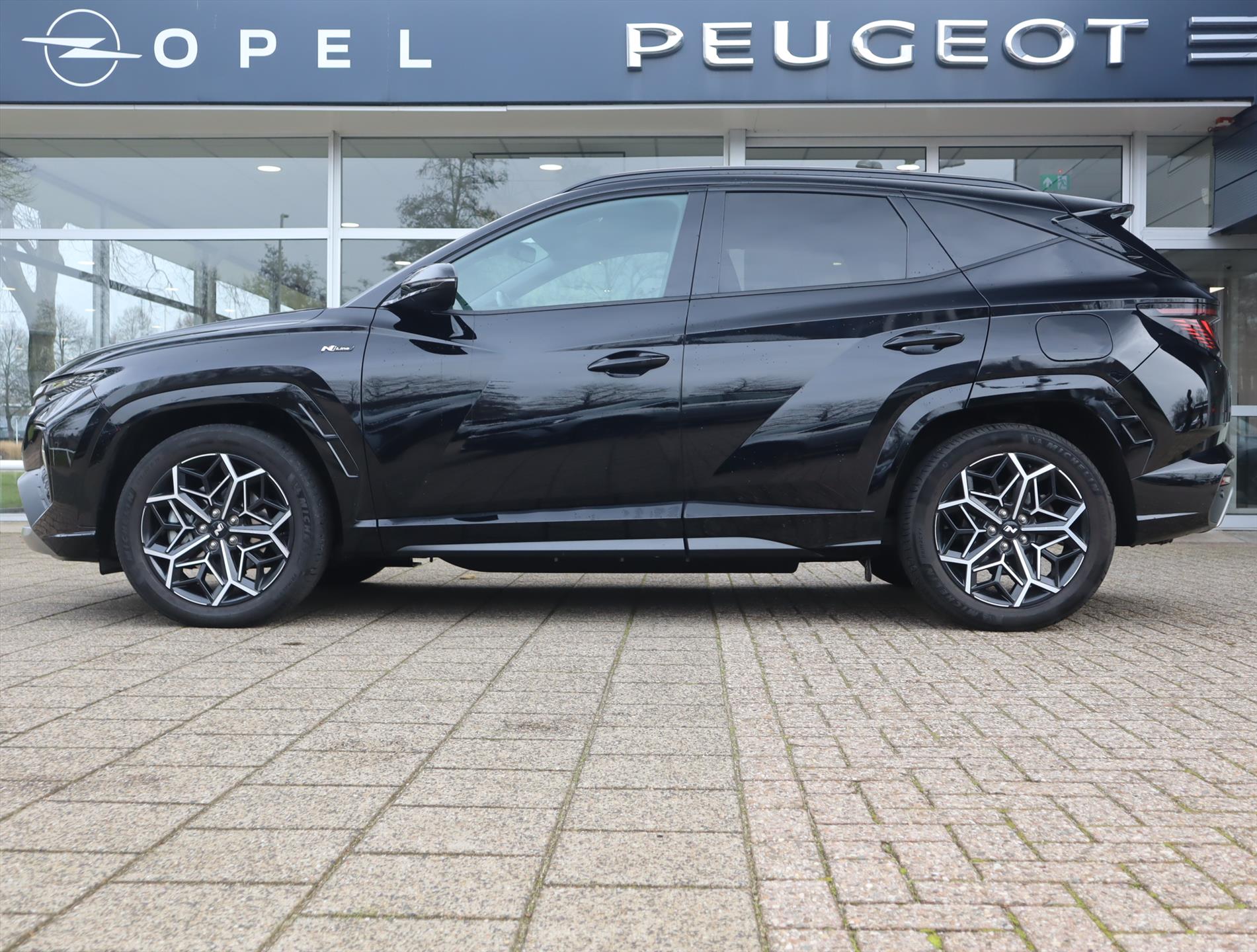 Hyundai Tucson N-Line 1.6 T-GDi PHEV 265pk AWD Automaat, Rijklaarprijs, Navigatie Stoel- en Stuurverwarming Stoelverkoeling Adaptieve cruise control Trekhaak - Afbeelding 2