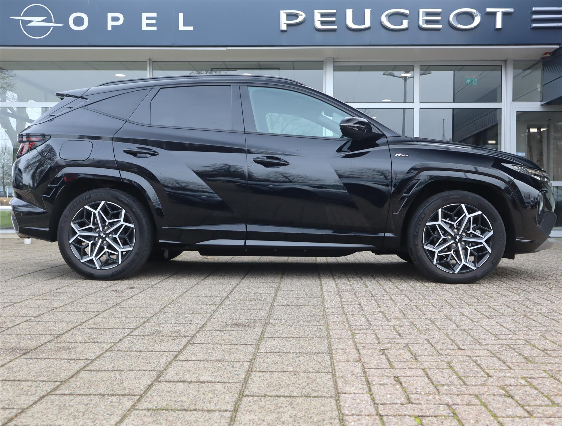 Hyundai Tucson N-Line 1.6 T-GDi PHEV 265pk AWD Automaat, Rijklaarprijs, Navigatie Stoel- en Stuurverwarming Stoelverkoeling Adaptieve cruise control Trekhaak - Afbeelding 3