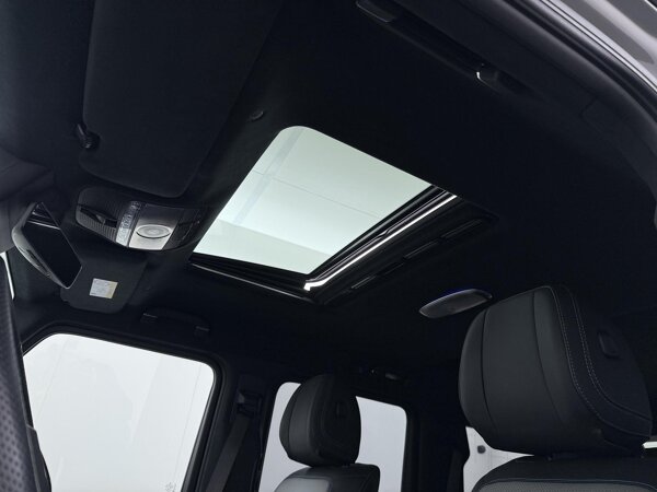 Elektrisch schuifdak in glas