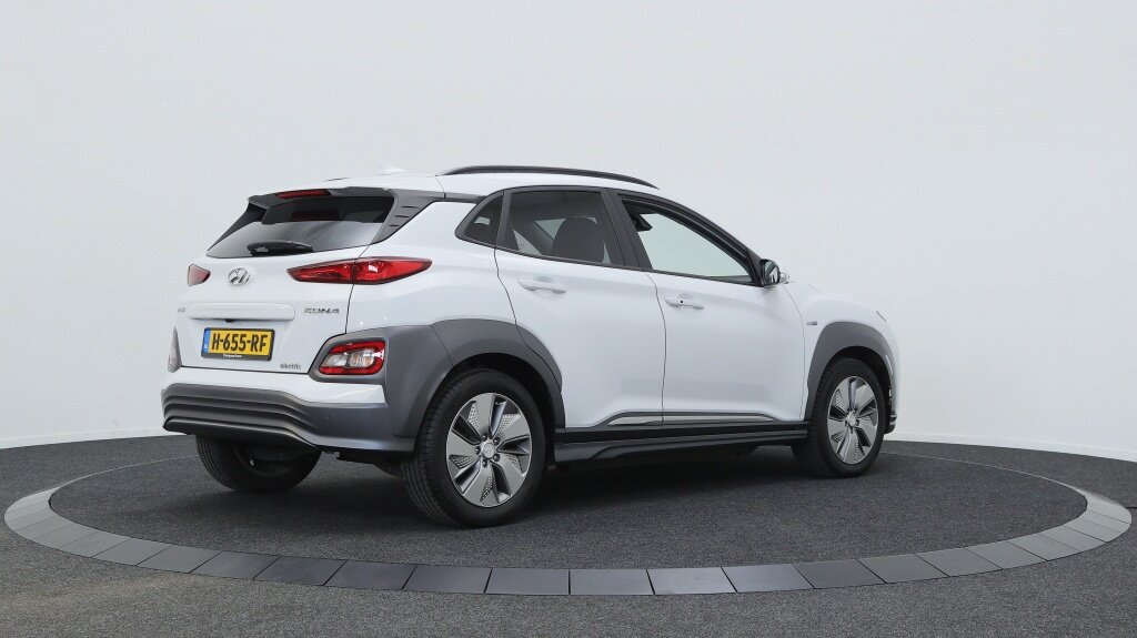 Hyundai Kona EV Premium 64 kWh | SOH 100% | Stoelverwarming | All Seasons | - Afbeelding 2
