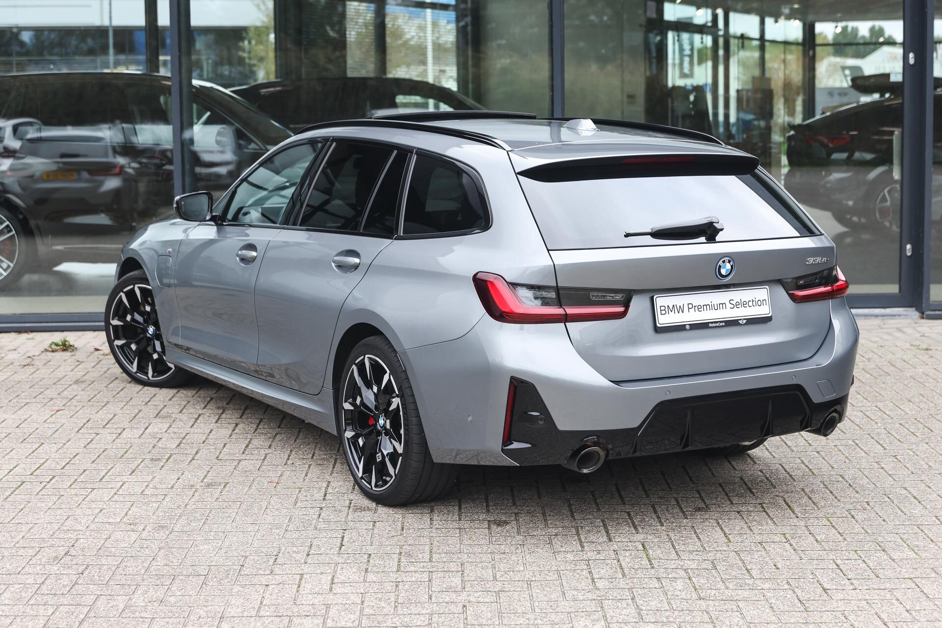 BMW 3 Serie Touring 330e High Executive M Sport Automaat - Afbeelding 2