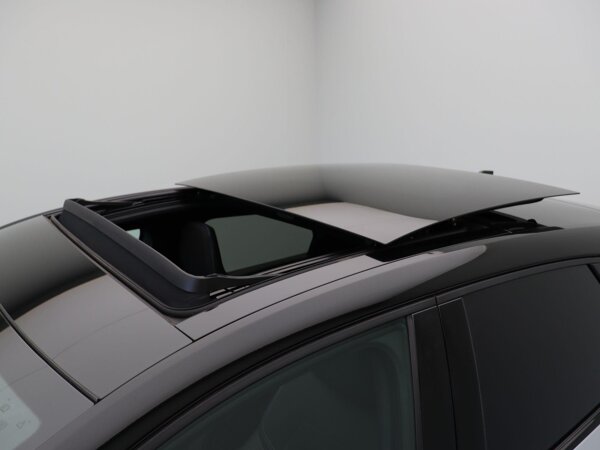 Elektrisch bedienbaar glazen schuif- en kanteldak