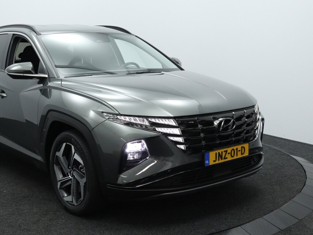 Hyundai Tucson 1.6 T-GDI HEV Comfort Smart | Navigatie | Camera | Stoelverwarmi - Afbeelding 4