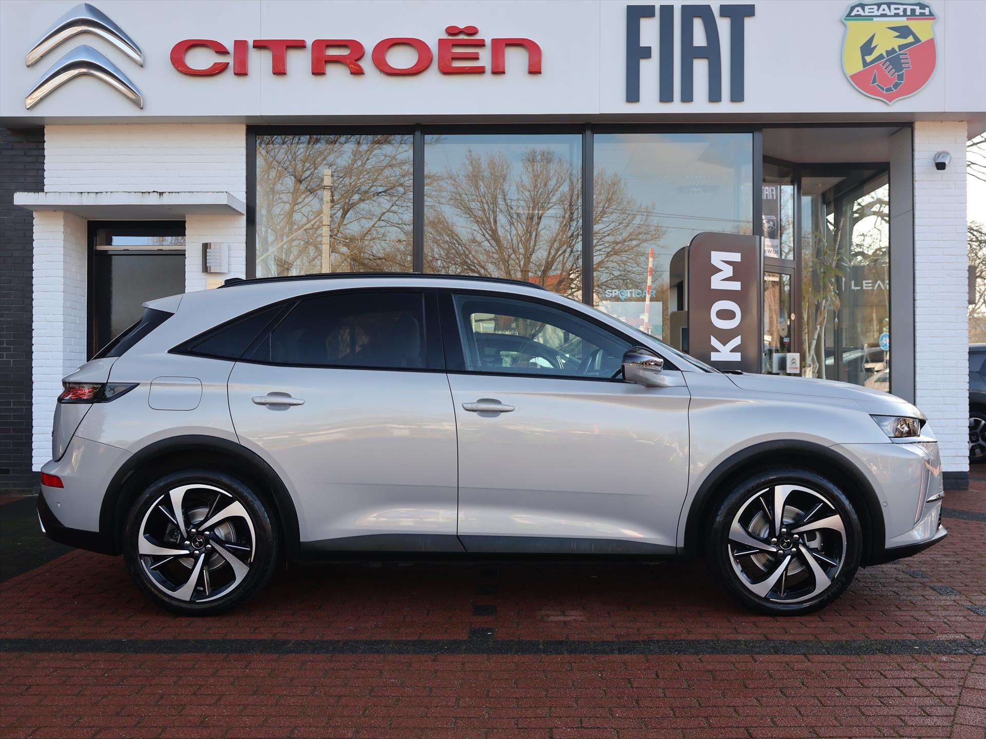 DS DS 7 E-Tense Plug-in Hybride 300PK 4x4 e-EAT8 Automaat Étoile, Rijklaarprijs | Panoramadak | Leder | Focal HiFi | Camera 360 - Afbeelding 4