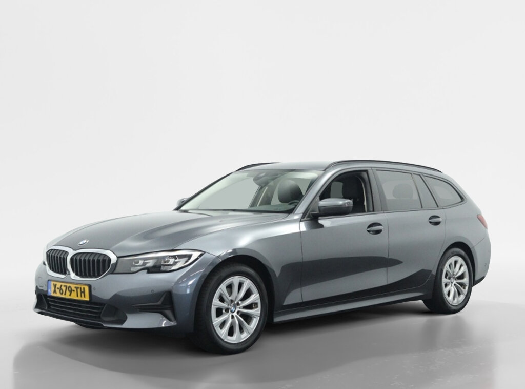 BMW 3 Serie Touring 318d High Executive Edition | Trekhaak | Leder | Camera | Naviga