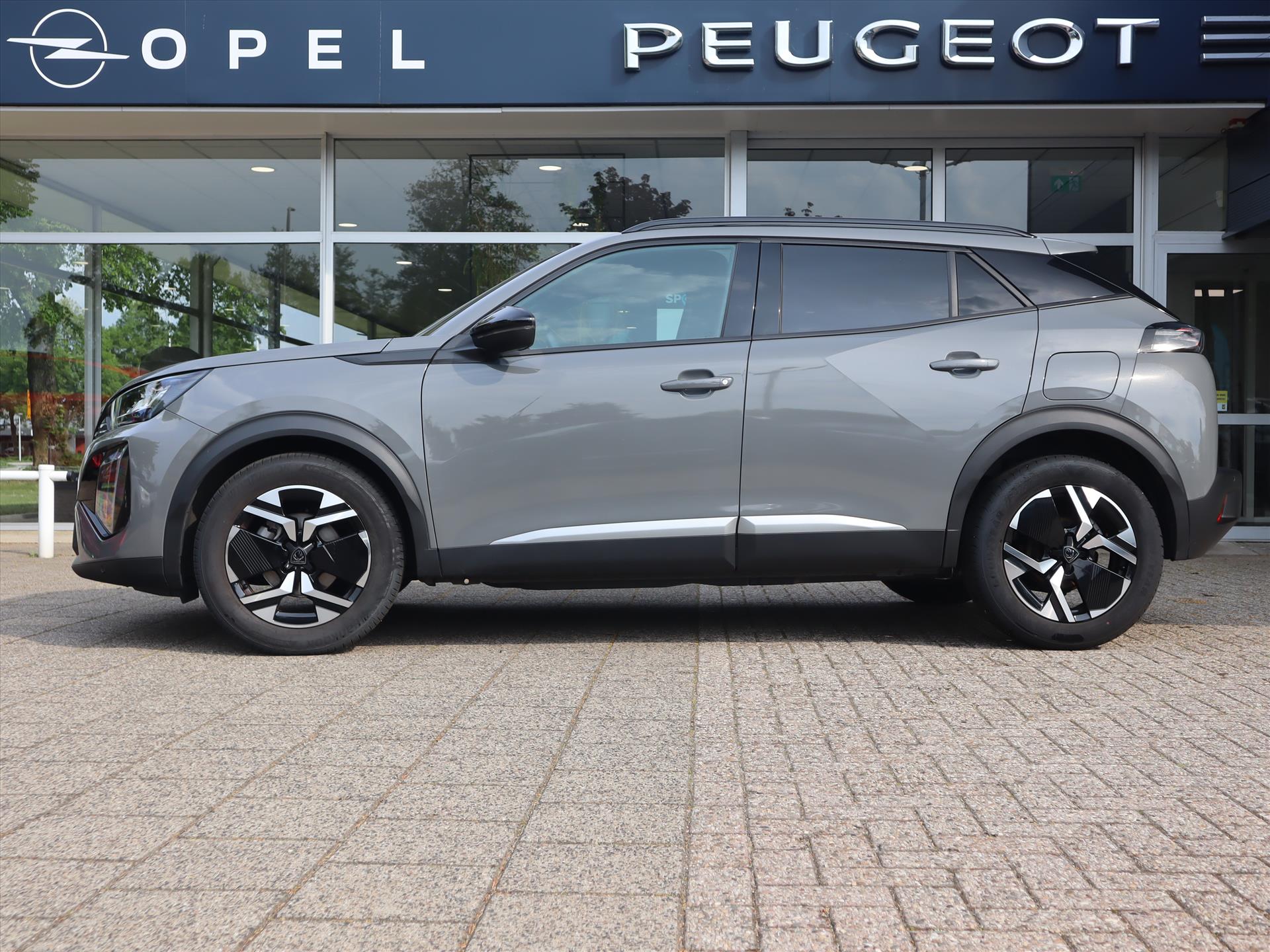 Peugeot 2008 SUV Allure PureTech 100pk H6, Rijklaarprijs, Navigatie Keyless Entry Sensoren voor en achter - Afbeelding 2