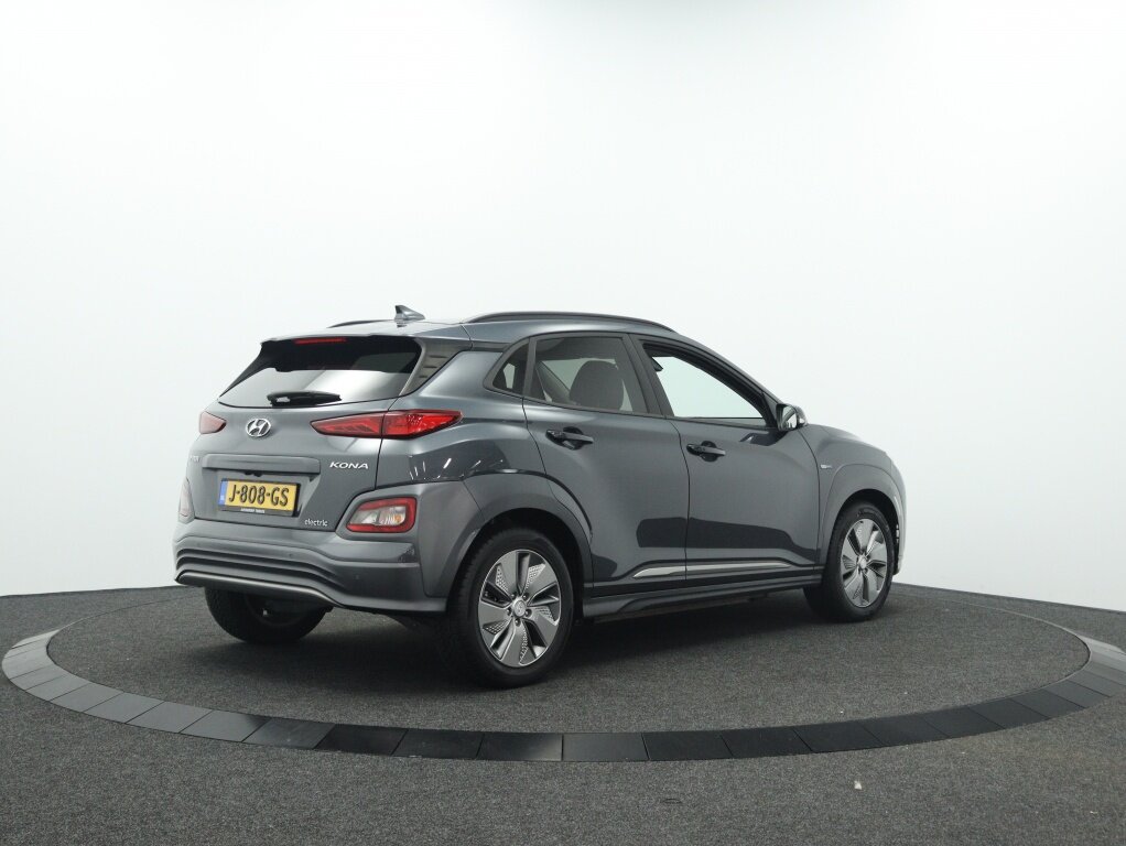 Hyundai Kona EV Premium 64 kWh | 1 Fase | Leder | Navigatie | Apple carplay | - Afbeelding 2