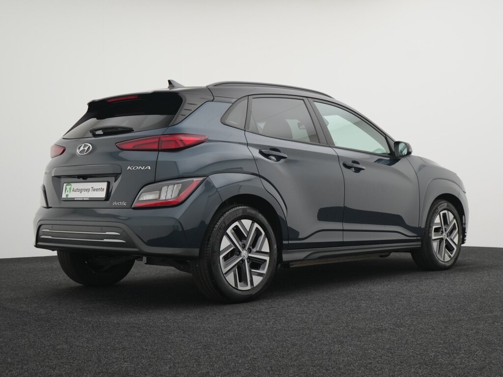 Hyundai Kona EV Premium 64 kWh | Wit leder | Navigatie | Camera | Stoelventil - Afbeelding 2