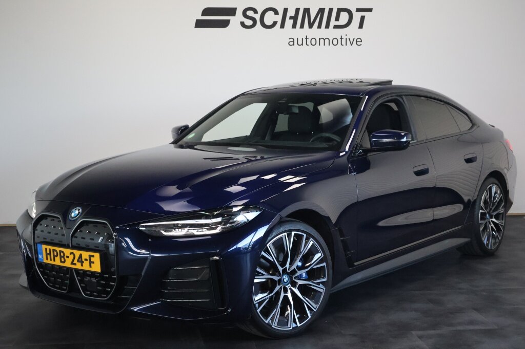 BMW i4 eDrive40 High Executive Individual | Harman Kardo | Schuifdak | Trekhaak | LED | 20"