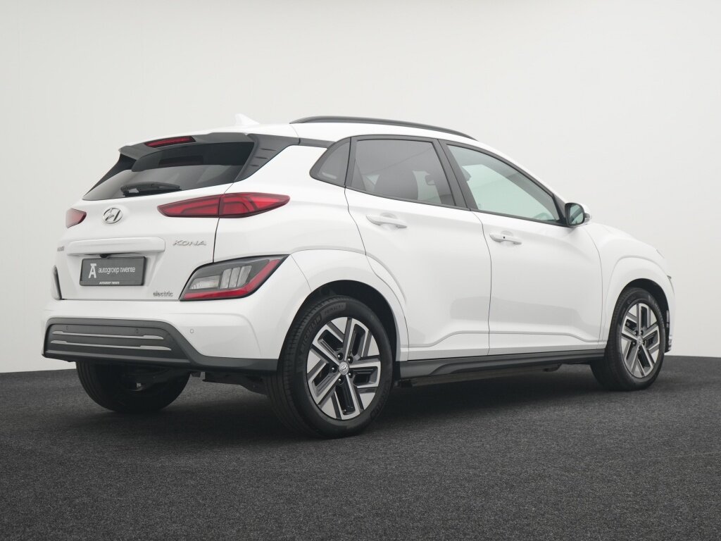 Hyundai Kona EV 64 kWh Comfort Adaptief | Camera | Stoel Verwarming | Navigatie | - Afbeelding 2