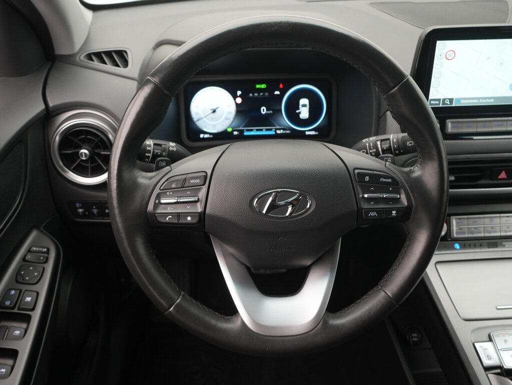 Hyundai Kona EV 64 kWh Comfort Adaptief | Camera | Stoel Verwarming | Navigatie | - Afbeelding 3