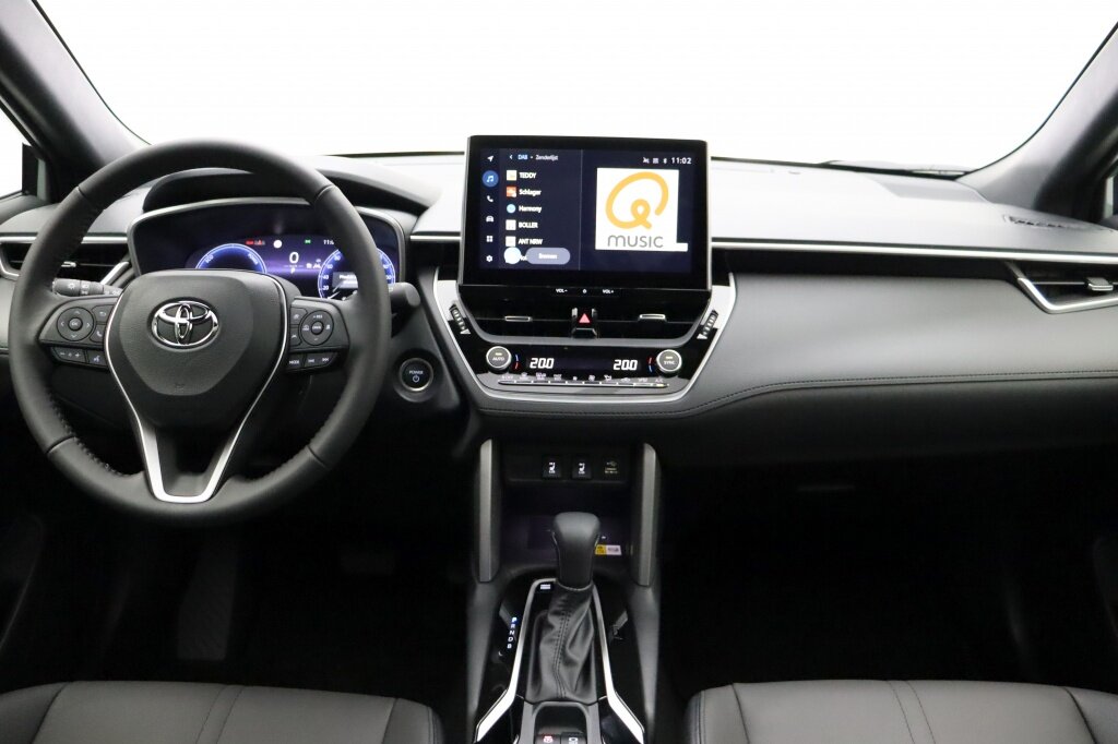 Toyota Corolla Cross 1.8 Hybride Style | Panoramadak | Camera | CarPlay | Leder - Afbeelding 2