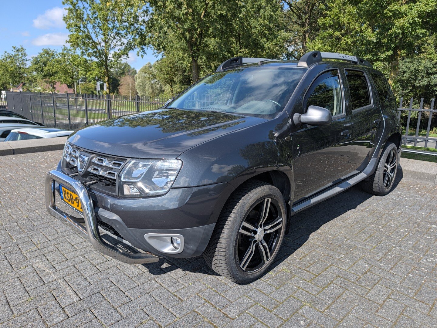 Dacia Duster 1.2 TCe 4x2 Série Limitée Robust | Trekhaak | Bullbar | Stoelverw. | PDC | Airco - Afbeelding 1