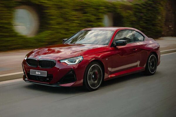 bmw-2-serie-coupe-rood-voorkant-rijdend-ekris.jpg