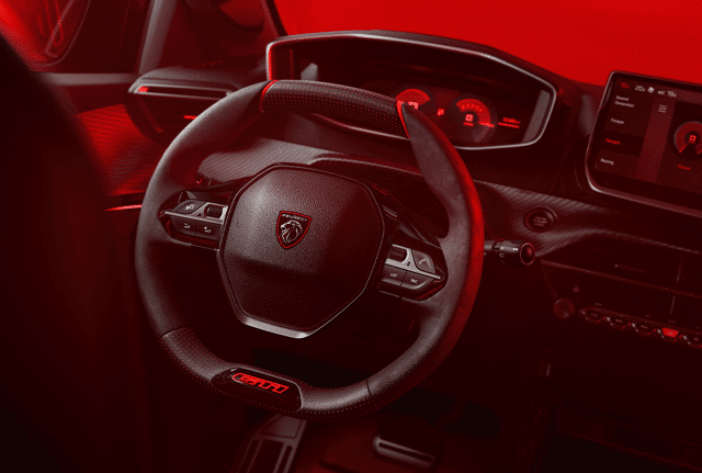 Dashboard met stuur van de Peugeot E-208 GTi